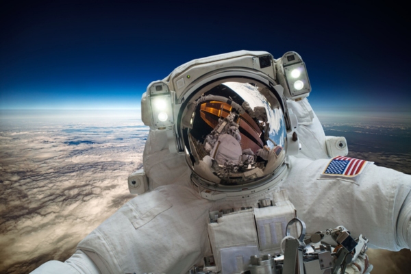 astronaut in full space suit depicting the role of cooling system to support life in space