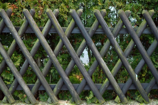 decorative fence can help conceal standy generator