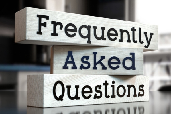 frequently asked questions written on wooden blocks depicting heating oil FAQs