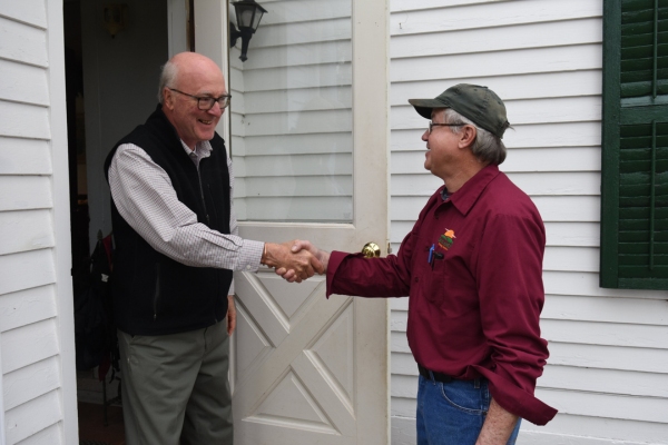 Skylands Energy Service technician and customer shaking hands