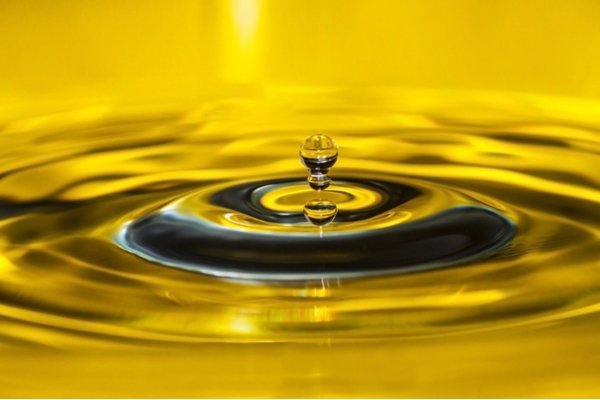 gold liquid drop depicting heating oil