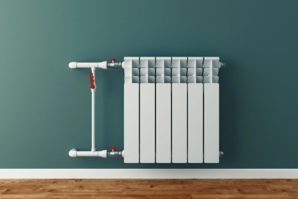 image of a hot water radiator installed against a wall