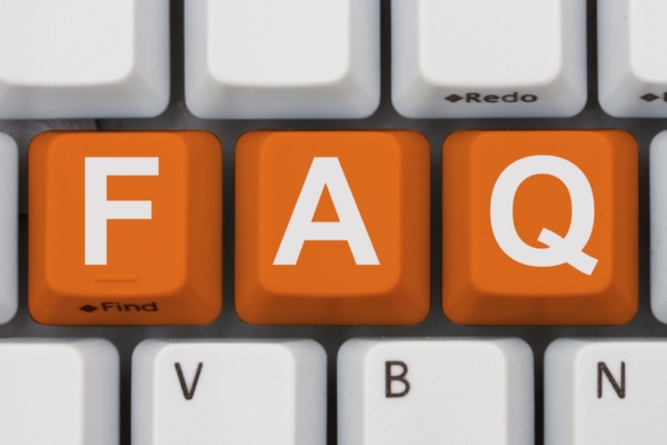 FAQ orange keyboard keys depicting common questions about heat pump