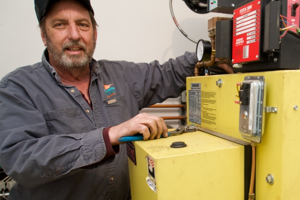 Skylands Energy Service HVAC technician doing boiler repair