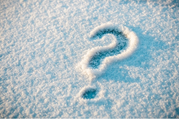 question mark written on snow depicting FAQs about boiler operation & efficiency