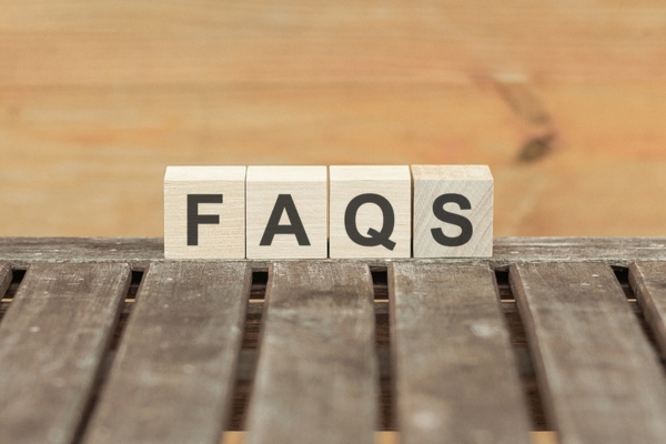 FAQS spelled using wooden letter chips depicting questions about ceiling fan direction