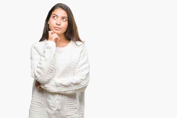 image of a woman thinking depicting selecting the ideal boiler replacement